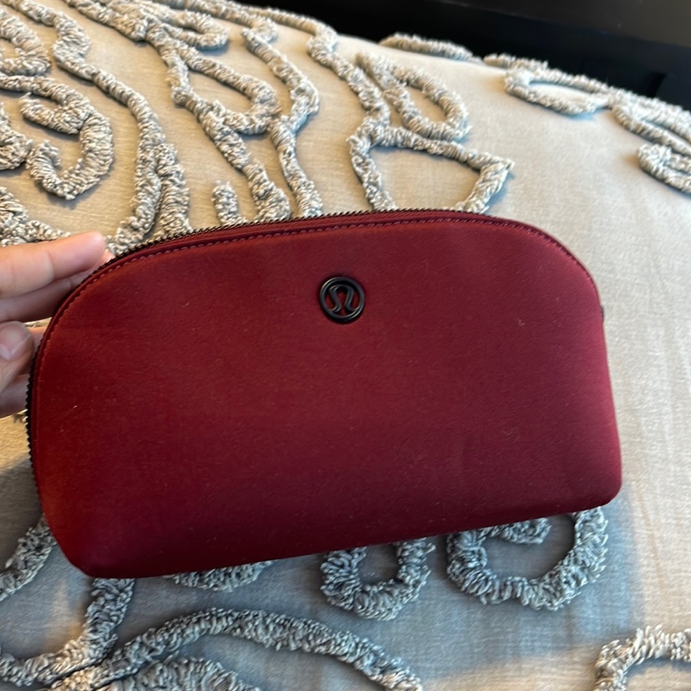 Sunup sundown deep red cosmetic bag